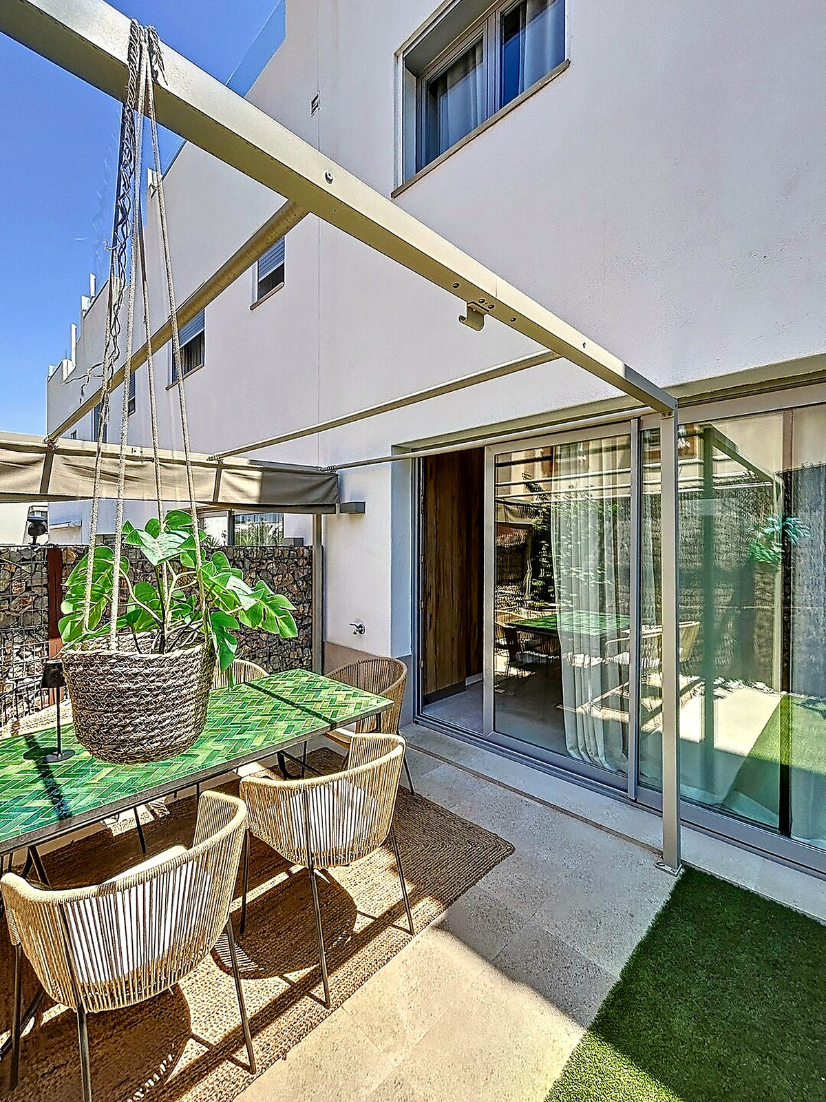 Sheltered patio at ground level